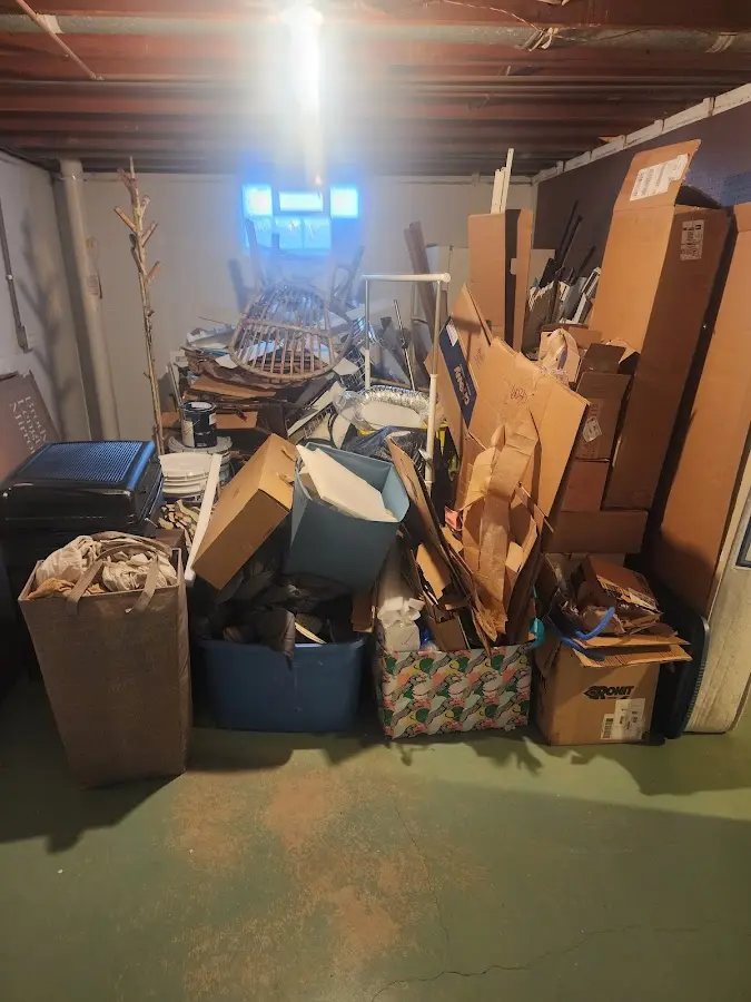 Roll-off dumpster container at job site for 15 Yard Dumpster Rental in Meadowbrook